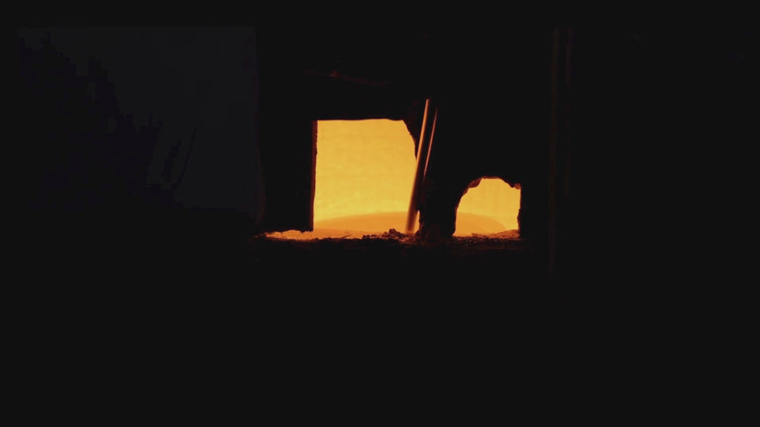 Manufacturing glass through a furnace